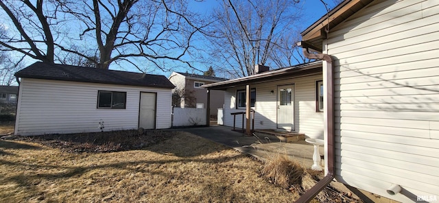 view of property exterior with a yard