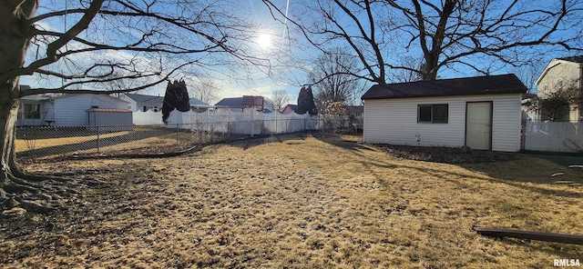 view of yard with a storage shed