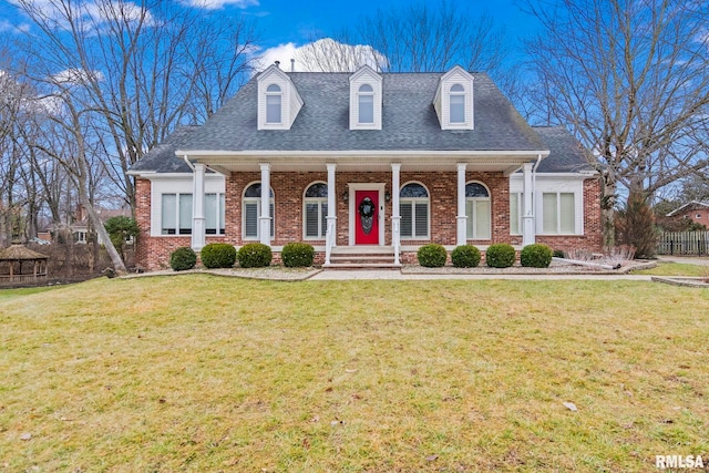 cape cod-style house with a porch and a front lawn