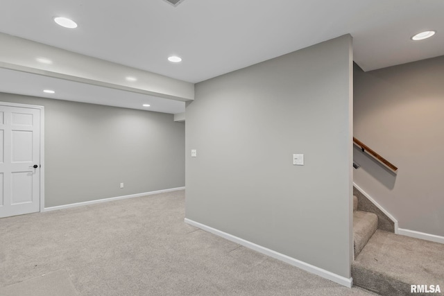 basement with light colored carpet