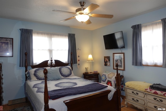 bedroom featuring ceiling fan