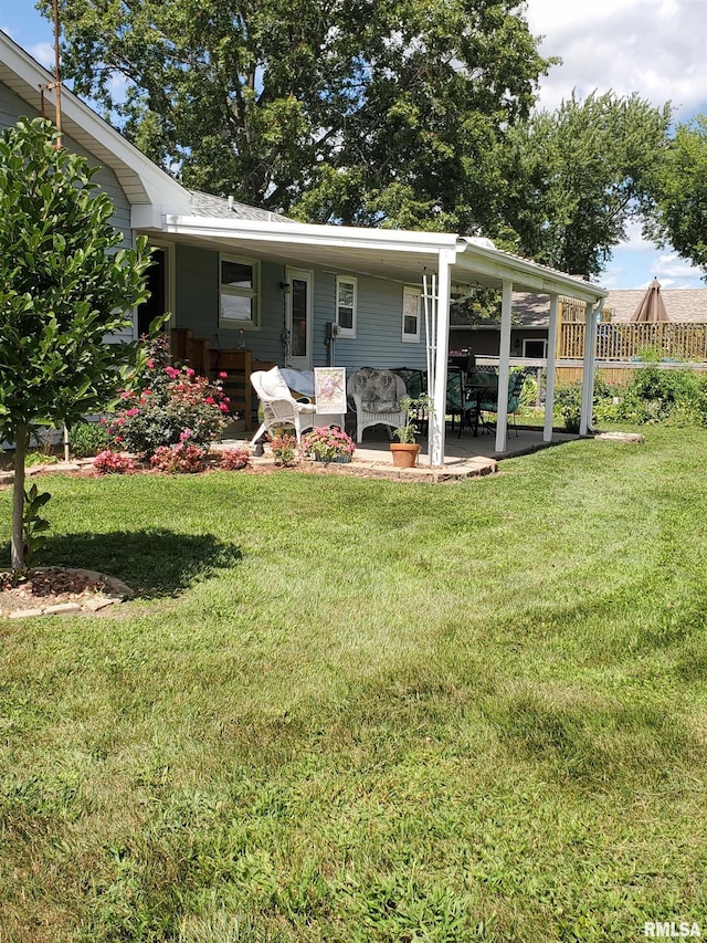 exterior space with a patio and a front yard