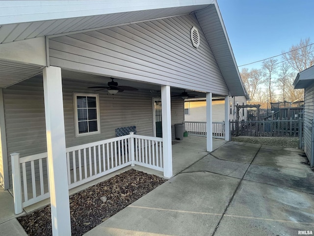 view of patio featuring ceiling fan and covered porch