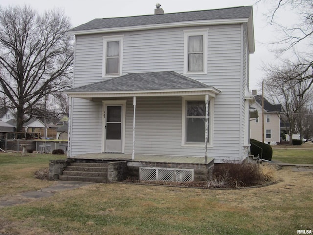 view of front facade featuring a front yard