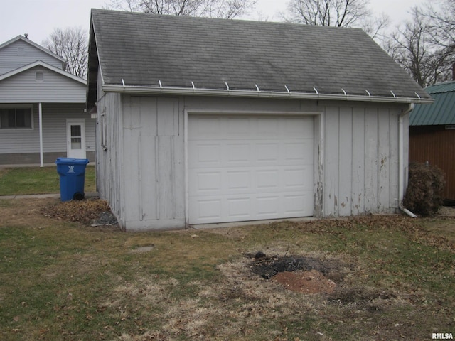 garage with a lawn