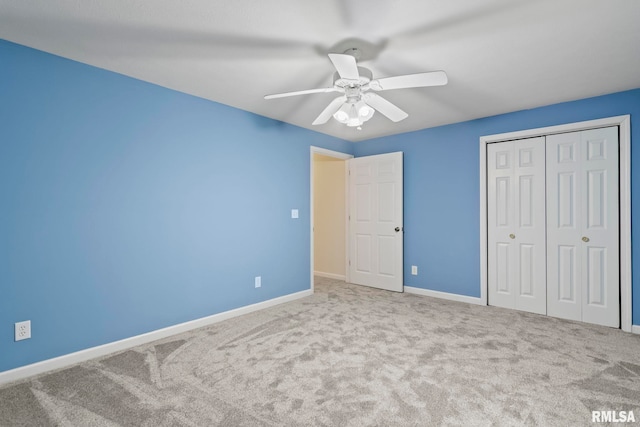 unfurnished bedroom with a closet, ceiling fan, and carpet