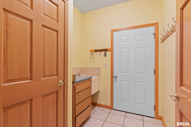 bathroom featuring tile patterned flooring