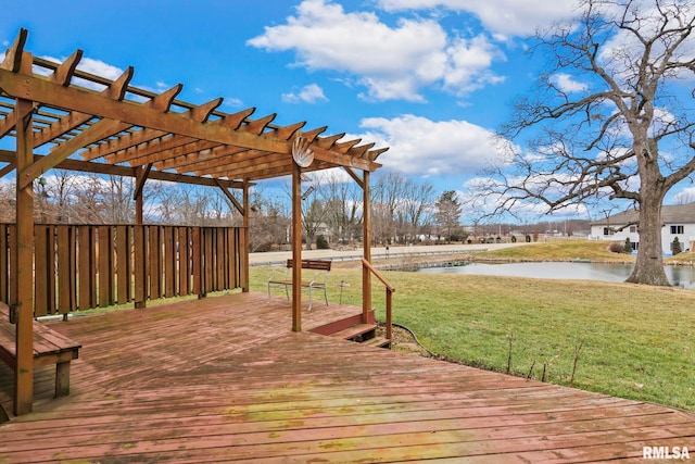 wooden deck with a water view, a yard, and a pergola