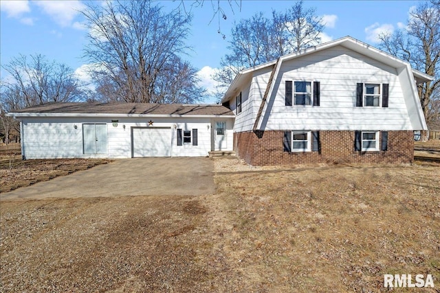 split level home with a garage