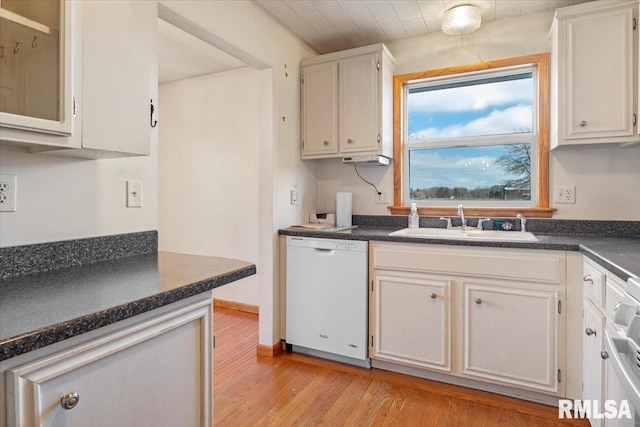 kitchen with sink, white cabinets, white dishwasher, crown molding, and light hardwood / wood-style flooring