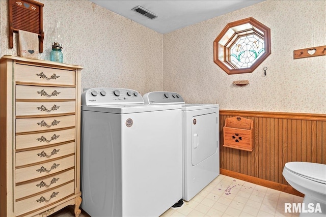 laundry room featuring independent washer and dryer