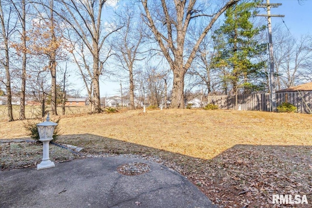 view of yard with fence