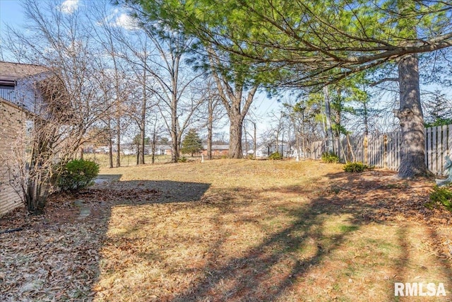 view of yard with fence