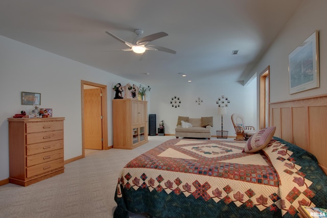 bedroom with light carpet and ceiling fan