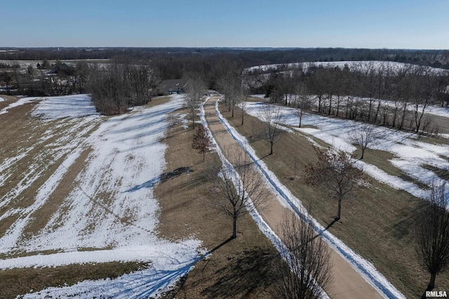 snowy aerial view with a rural view