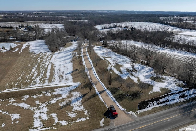 snowy aerial view with a rural view