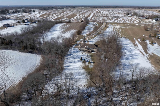 snowy aerial view featuring a rural view