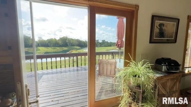 entryway with a water view