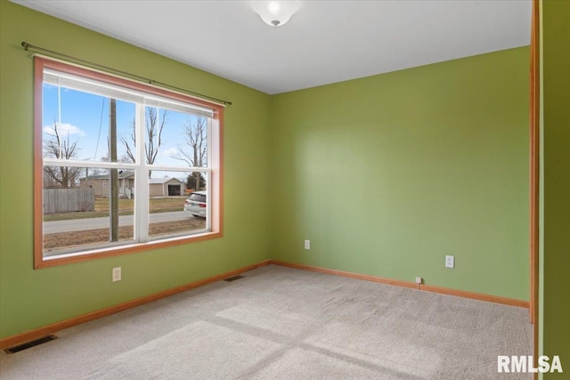 empty room featuring carpet floors