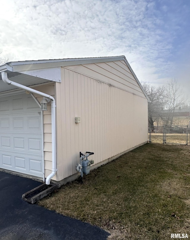 garage with a yard