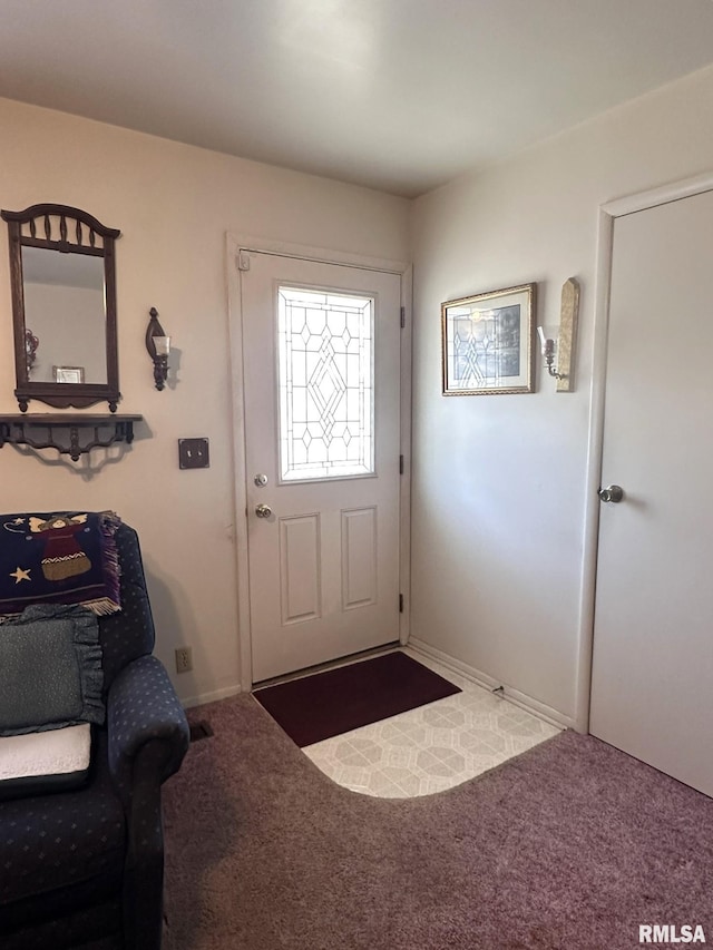 entrance foyer featuring carpet