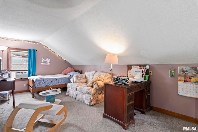 bedroom with lofted ceiling, cooling unit, a textured ceiling, and carpet flooring