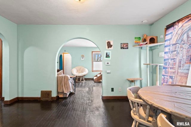 interior space featuring dark wood-type flooring