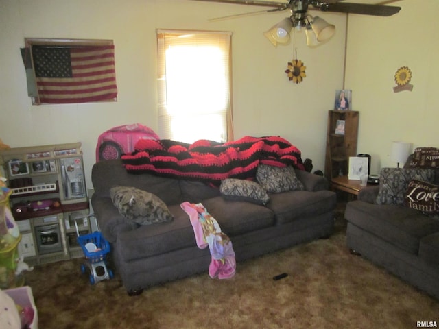 carpeted living room with ceiling fan