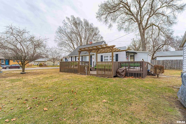 exterior space with a wooden deck and a pergola