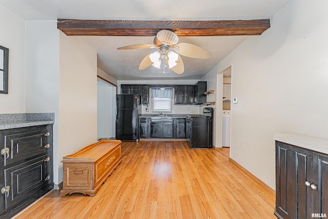 kitchen with sink, ceiling fan, beam ceiling, black appliances, and light hardwood / wood-style floors