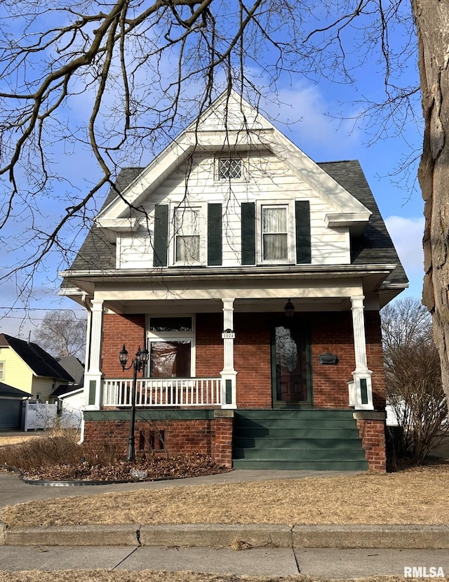 view of front of property featuring covered porch