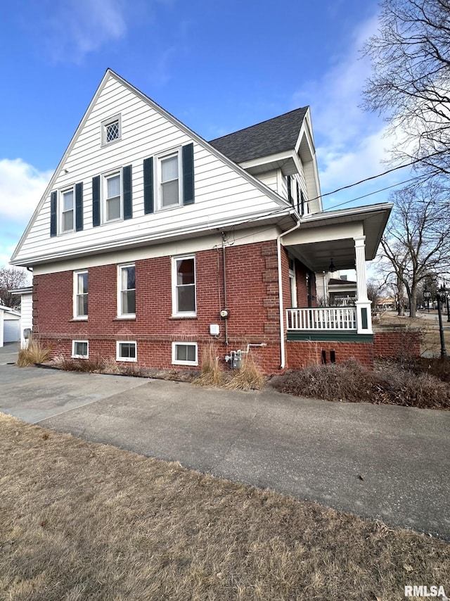 view of home's exterior featuring a porch