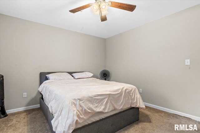 bedroom with ceiling fan and carpet