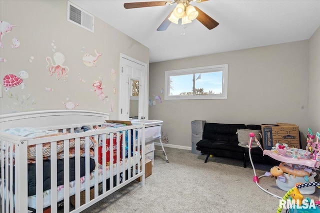 carpeted bedroom featuring ceiling fan