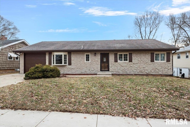 ranch-style home with a garage and a front lawn