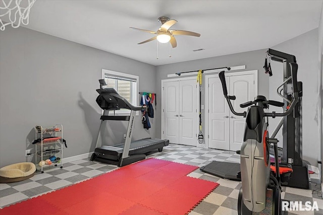 workout room featuring ceiling fan