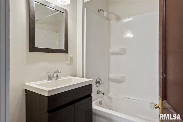 bathroom with vanity and bathing tub / shower combination