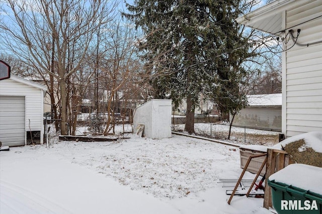 view of yard layered in snow