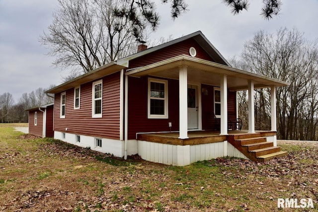 view of front of property featuring covered porch