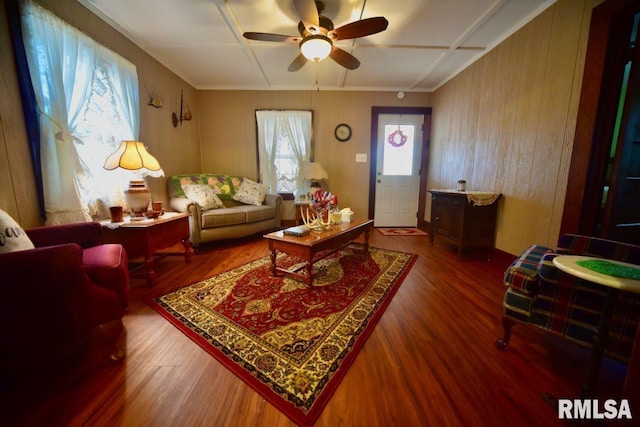 living room with hardwood / wood-style flooring and ceiling fan