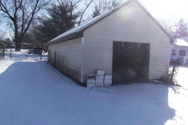 view of snow covered garage