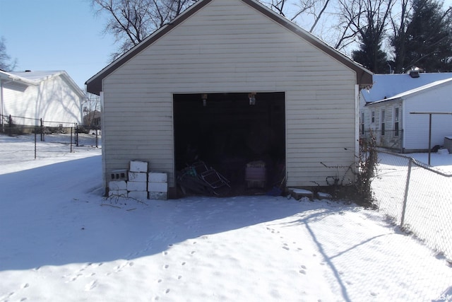 view of snow covered garage