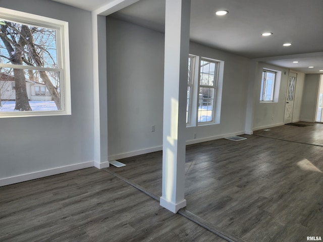 foyer with dark hardwood / wood-style flooring