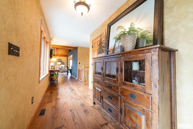 hall featuring wood-type flooring