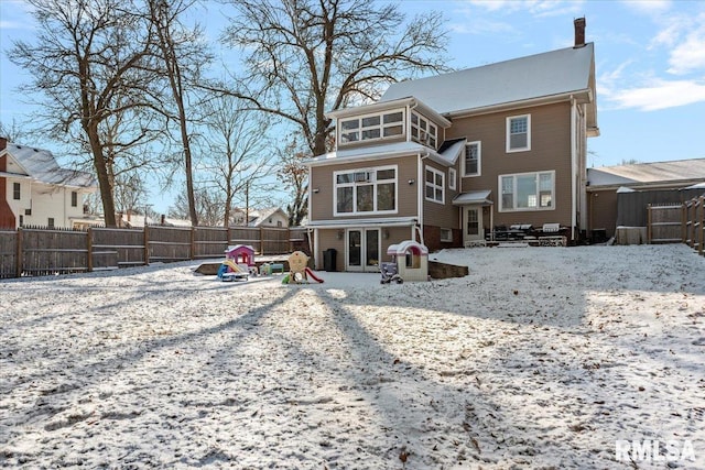 view of snow covered property