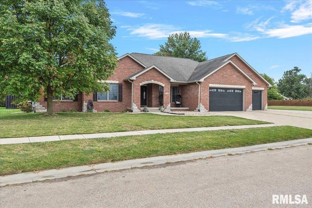 single story home with a garage and a front lawn