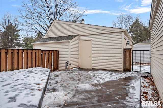 view of snow covered garage