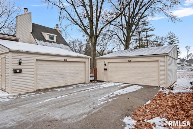 view of snow covered garage