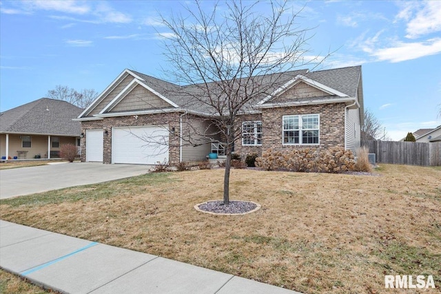 view of front of house with a front lawn and a garage