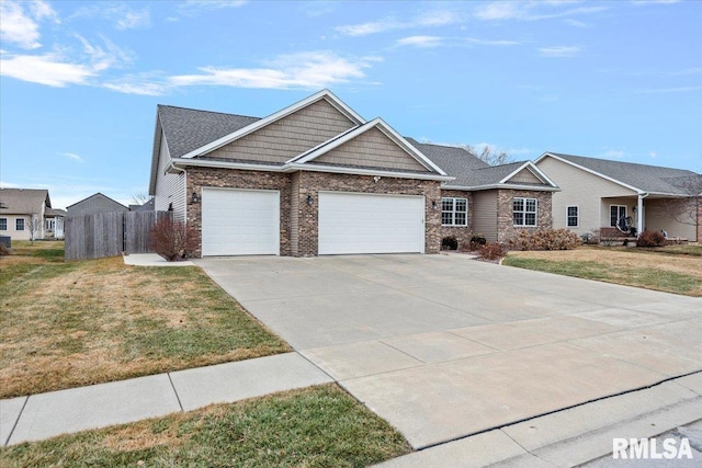 view of front facade with a front yard and a garage